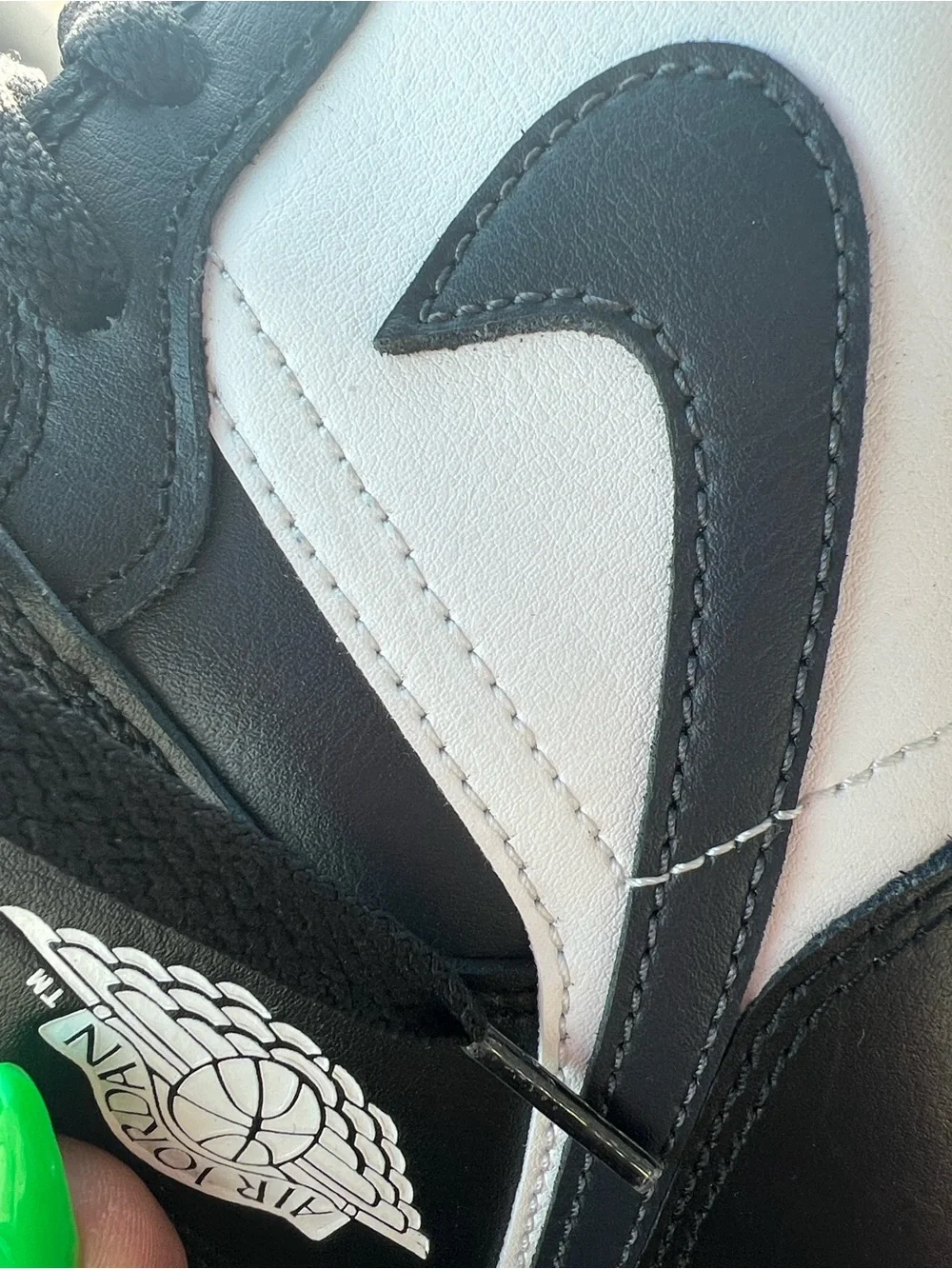 Jordan Black and White Mid-Top Sneakers